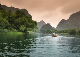 People Riding a Boat